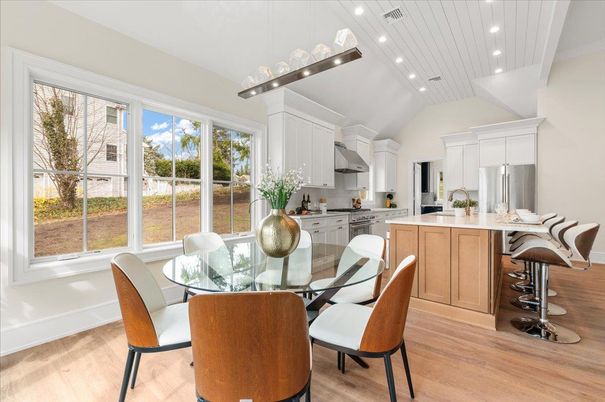 Dining room, Interior, Kitchen, Pendant Lights, Recessed Lighting, Stainless Steel Appliances, Wood Texture Flooring