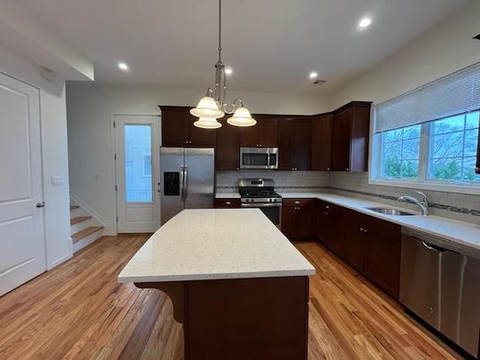 Interior, Kitchen, Pendant Lights, Recessed Lighting, Stainless Steel Appliances, Wood Texture Flooring