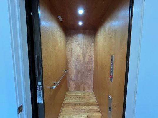 Elevator, Interior, Recessed Lighting, Wooden Ceilings, Wood Texture Flooring, Wooden Walls