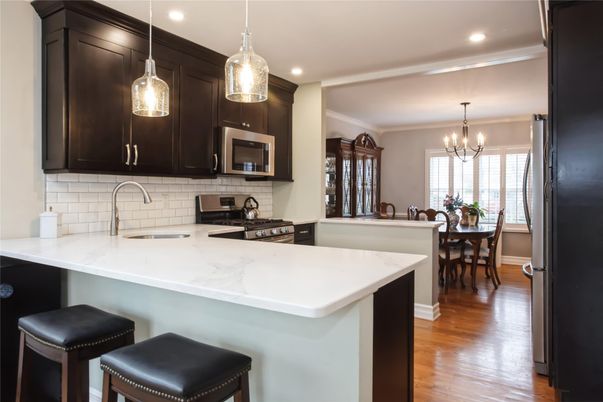 Chandelier, Dining room, Interior, Kitchen, Pendant Lights, Recessed Lighting, Stainless Steel Appliances, Wood Texture Flooring