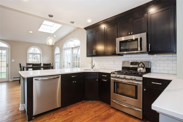 Dining room, Interior, Kitchen, Pendant Lights, Recessed Lighting, Stainless Steel Appliances, Wood Texture Flooring