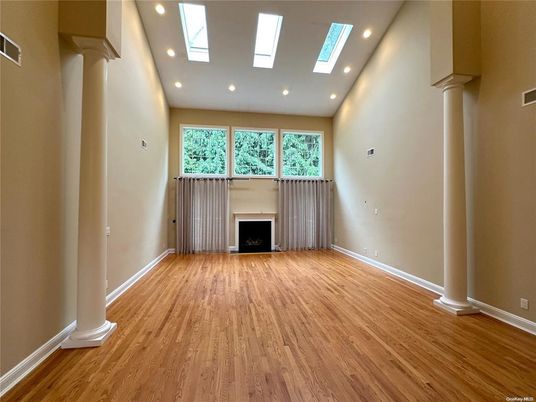 Empty room, Fireplace, Interior, Recessed Lighting, Wood Texture Flooring