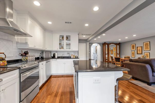 Dining room, Interior, Kitchen, Recessed Lighting, Stainless Steel Appliances, Wood Texture Flooring