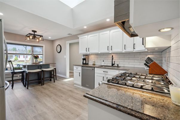 Dining room, Interior, Kitchen, Recessed Lighting, Stainless Steel Appliances, Wood Texture Flooring