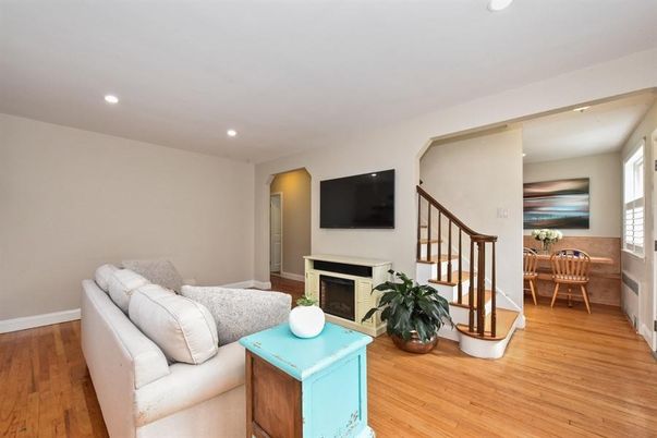 Dining room, Fireplace, Interior, Living room, Recessed Lighting, Wood Texture Flooring