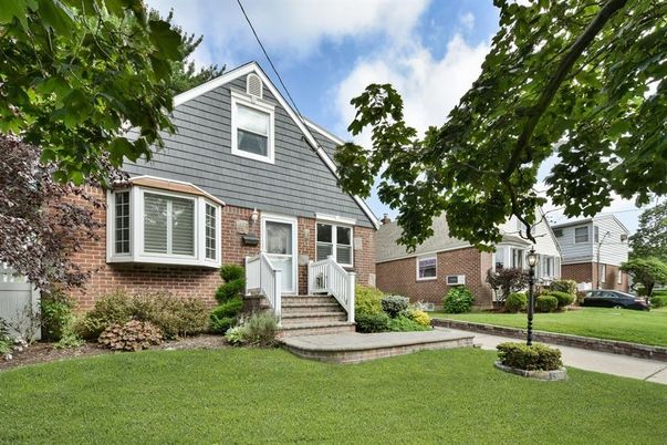 Exterior, Facade, Brick Facade, Cape Cod