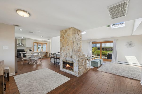 Dining room, Fireplace, Interior, Kitchen, Recessed Lighting, Wood Texture Flooring