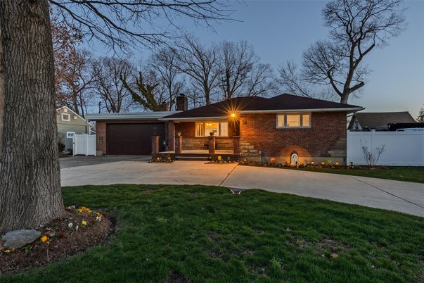 Attached, Backyard, Exterior, Facade, Brick Facade, Split Level