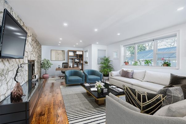 Fireplace, Interior, Living room, Recessed Lighting, Stone Walls, Wood Texture Flooring