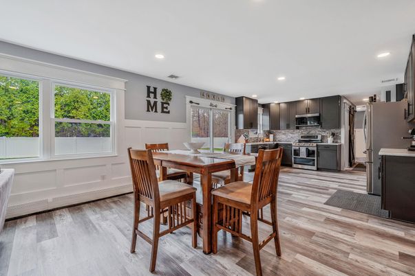 Dining room, Interior, Kitchen, Recessed Lighting, Stainless Steel Appliances, Wood Texture Flooring