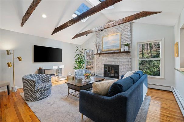 Fireplace, Interior, Living room, Recessed Lighting, Stone Walls, Wooden Beams, Wood Texture Flooring