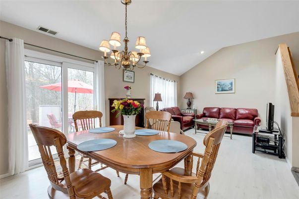 Chandelier, Dining room, Fireplace, Interior, Living room, Recessed Lighting, Wood Texture Flooring