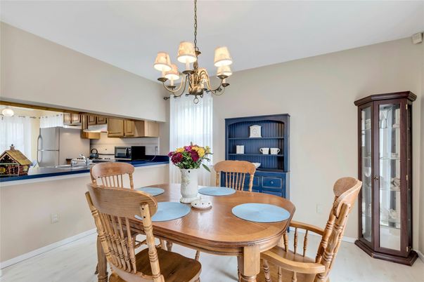 Chandelier, Dining room, Interior, Kitchen, Stainless Steel Appliances, Wood Texture Flooring