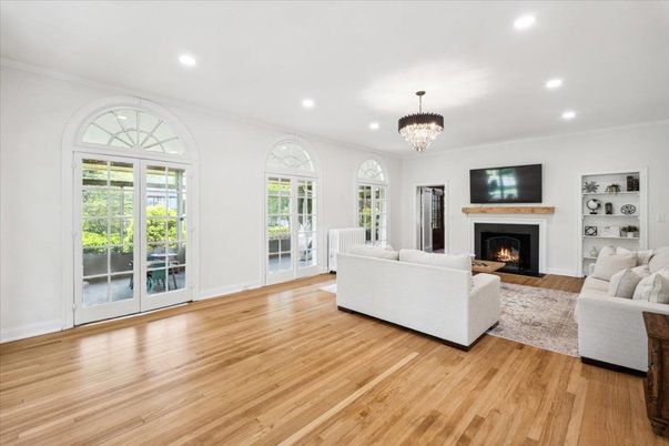 Chandelier, Fireplace, Interior, Living room, Recessed Lighting, Wood Texture Flooring