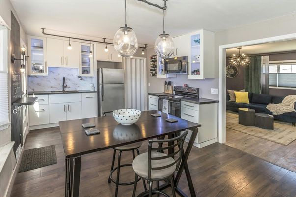 Dining room, Interior, Kitchen, Pendant Lights, Stainless Steel Appliances, Wood Texture Flooring