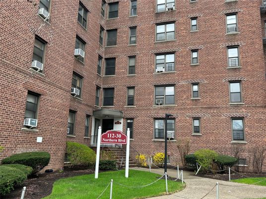 Exterior, Facade, Brick Facade, Condo Building