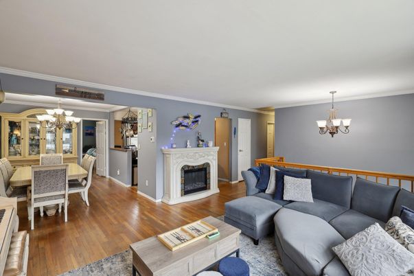 Chandelier, Dining room, Fireplace, Interior, Living room, Wood Texture Flooring