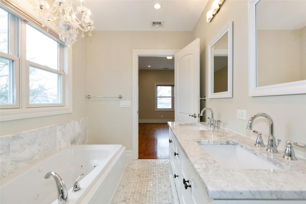 Bathroom, Chandelier, Dual Sink Vanities, Interior, Recessed Lighting, Wood Texture Flooring