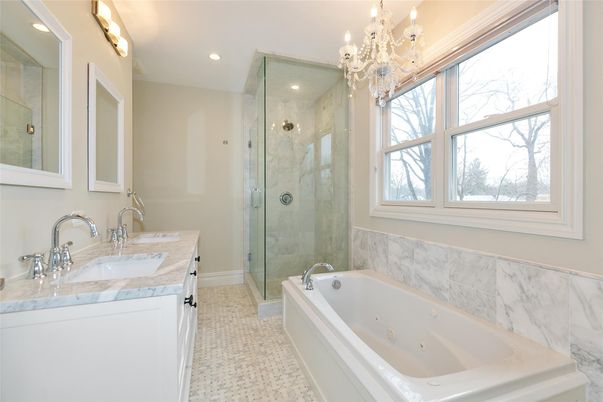 Bathroom, Chandelier, Dual Sink Vanities, Glass Shower, Interior, Marble Walls, Recessed Lighting