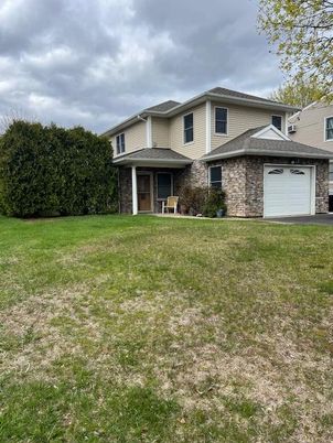 Attached, Backyard, Exterior, Facade, Brick Facade, Split Level