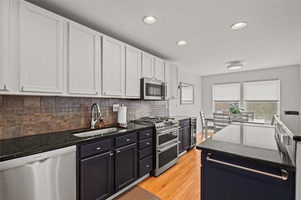Dining room, Interior, Kitchen, Recessed Lighting, Stainless Steel Appliances, Wood Texture Flooring