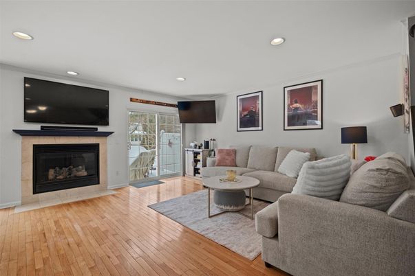 Fireplace, Interior, Living room, Recessed Lighting, Wood Texture Flooring