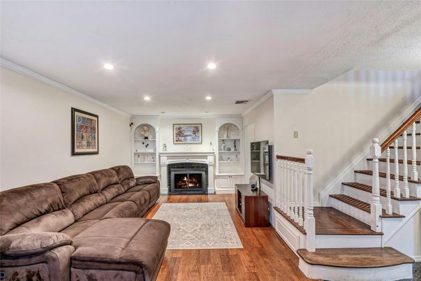 Fireplace, Interior, Living room, Recessed Lighting, Wood Texture Flooring