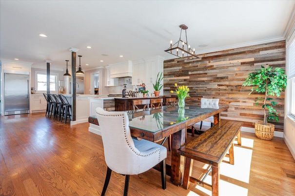 Dining room, Interior, Kitchen, Pendant Lights, Recessed Lighting, Stainless Steel Appliances, Wood Texture Flooring, Wooden Walls