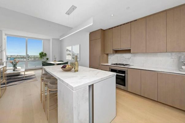 Dining room, Interior, Kitchen, Pendant Lights, Recessed Lighting, Stainless Steel Appliances, Water, Wood Texture Flooring