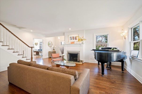 Fireplace, Interior, Living room, Piano, Recessed Lighting, Wood Texture Flooring