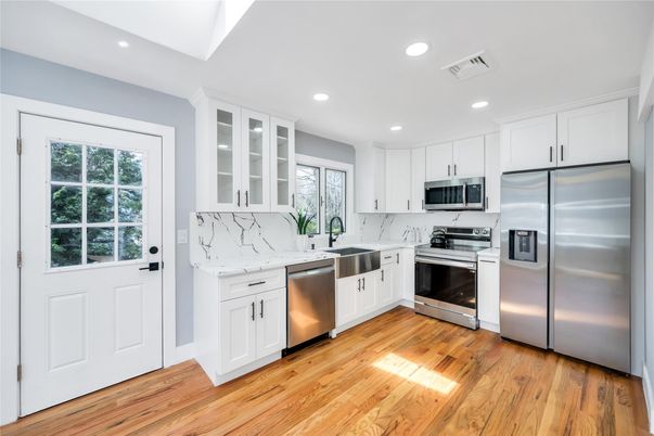 Interior, Kitchen, Recessed Lighting, Stainless Steel Appliances, Wood Texture Flooring