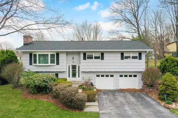 Attached, Exterior, Facade, Raised Ranch