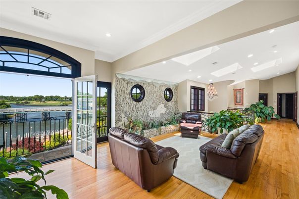 Interior, Living room, Recessed Lighting, Stone Walls, Water, Wood Texture Flooring