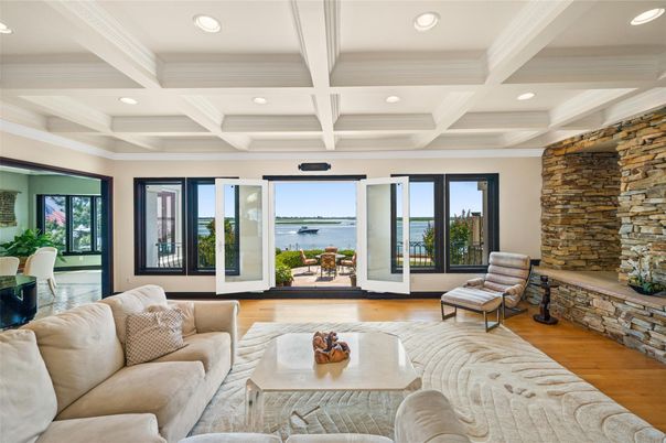 Interior, Living room, Recessed Lighting, Stone Walls, Water, Wood Texture Flooring