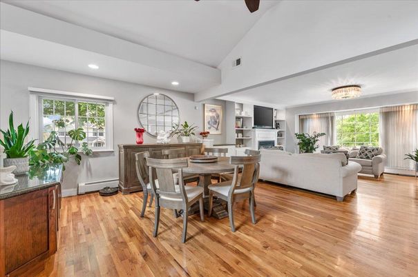 Dining room, Fireplace, Interior, Living room, Recessed Lighting, Wood Texture Flooring