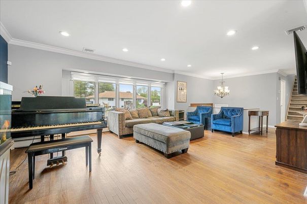 Chandelier, Interior, Living room, Piano, Recessed Lighting, Wood Texture Flooring