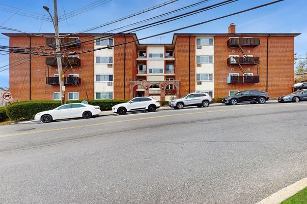 Exterior, Facade, Brick Facade, Condo Building