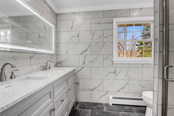 Bathroom, Dual Sink Vanities, Glass Shower, Interior, Marble Walls