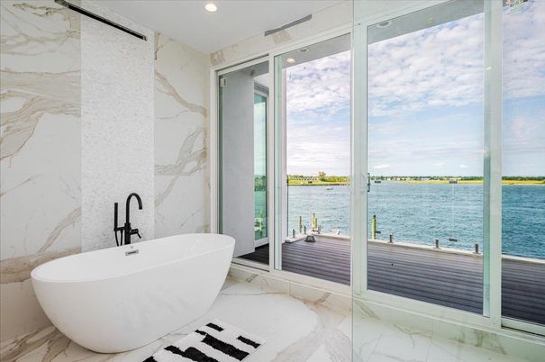 Bathroom, Free Standing Baths, Interior, Marble, Marble Walls, Recessed Lighting, Water