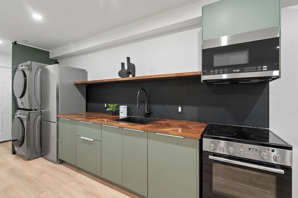 Interior, Kitchen, Recessed Lighting, Washer, Wood Texture Flooring