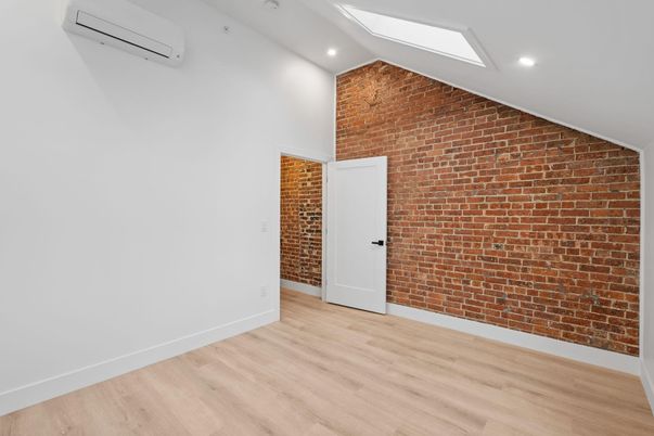 Empty room, Interior, Recessed Lighting, Stone Walls, Wood Texture Flooring
