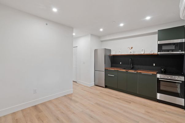 Interior, Kitchen, Recessed Lighting, Stainless Steel Appliances, Wood Texture Flooring