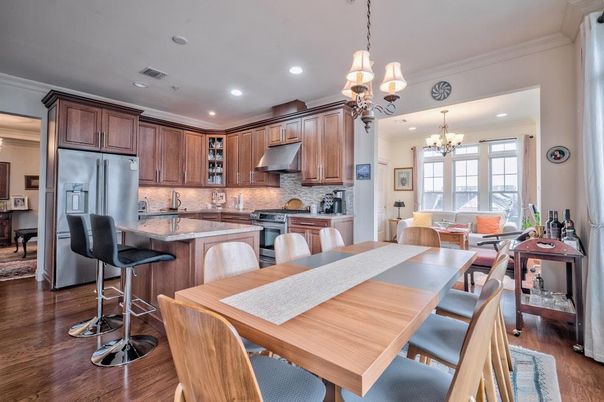 Chandelier, Dining room, Interior, Kitchen, Recessed Lighting, Stainless Steel Appliances, Wood Texture Flooring