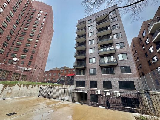 Exterior, Facade, Brick Facade, Condo Building