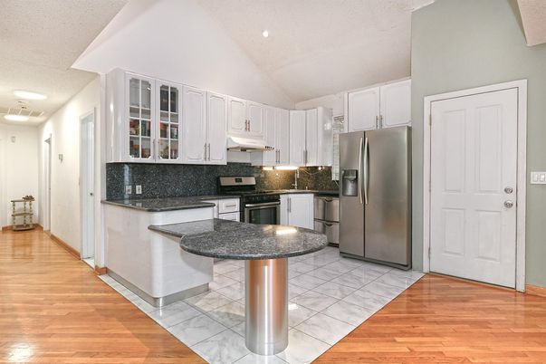Interior, Kitchen, Marble, Recessed Lighting, Stainless Steel Appliances, Wood Texture Flooring