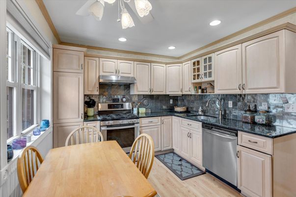 Dining room, Interior, Kitchen, Recessed Lighting, Stainless Steel Appliances, Wood Texture Flooring