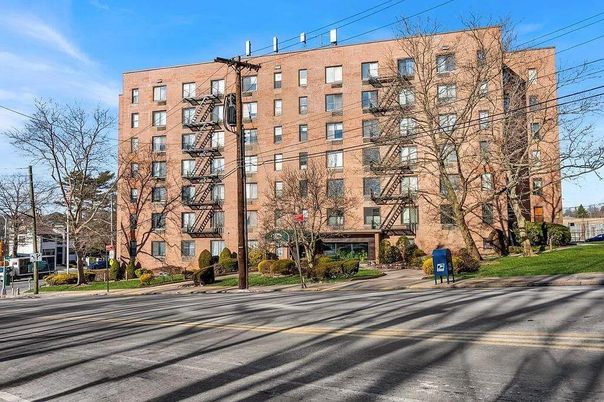 Exterior, Facade, Brick Facade, Condo Building