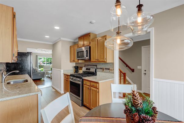 Interior, Kitchen, Pendant Lights, Recessed Lighting, Stainless Steel Appliances, Wood Texture Flooring