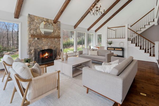 Chandelier, Fireplace, Interior, Living room, Stone Walls, Wooden Beams, Wood Texture Flooring