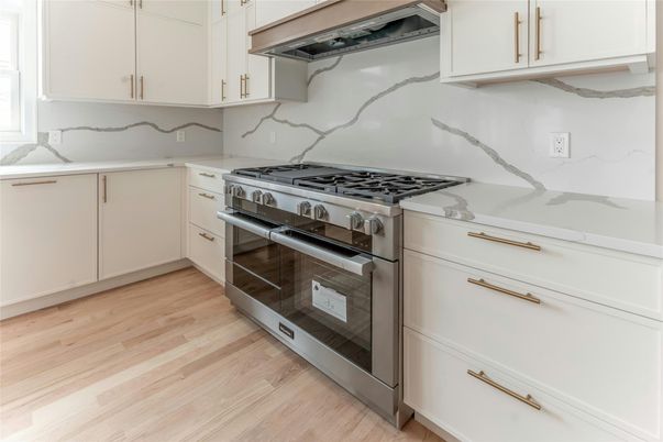 Interior, Kitchen, Marble Walls, Stainless Steel Appliances, Wood Texture Flooring